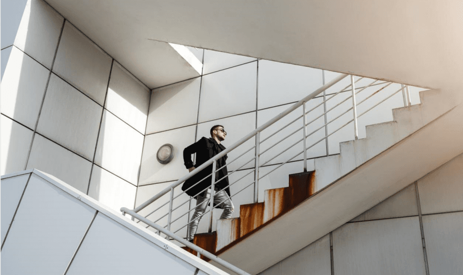 Seller climbing stairs to represent leveling up on KennFlik